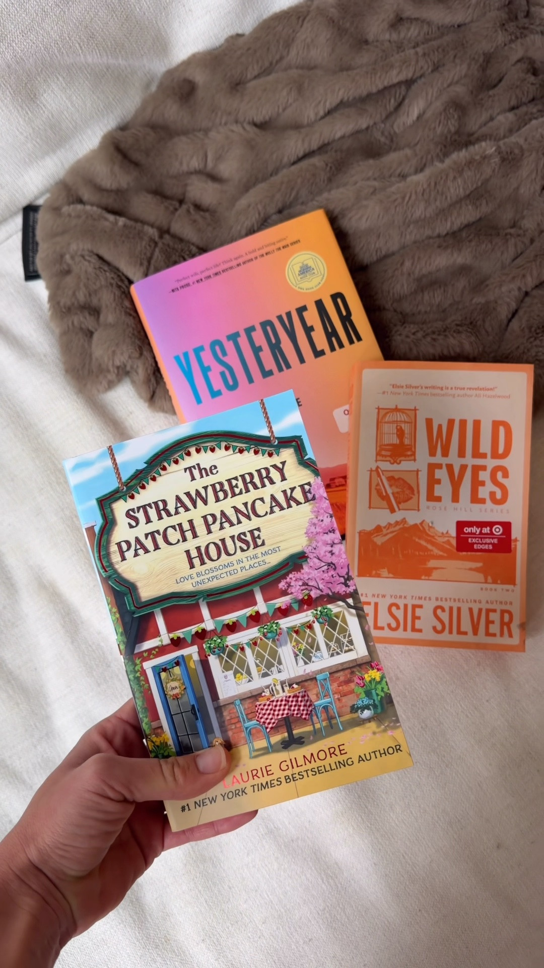 #ad I’m getting summer-read-ready with the help of @Target! I just grabbed a haul of new books that are perfect for your summer reading list:

1. Around the Table - perfect for the hostess, or anyone who loves home styling and cozy lifestyle!
2. The Strawberry Patch Pancake House - like a spring Hallmark movie! A cute and cozy romance, that you’ll fly through!
3. Yesteryear - when a trad-wife influencer wakes up in a world different than her own, you’ll laugh at the irony and twists and turns of her next steps!
4. Wild Eyes - a country star seeks refuge from some bad press in the mountains, but instead of finding just rest and relaxation, she finds romance too!

#TargetPartner #TargetBooks
