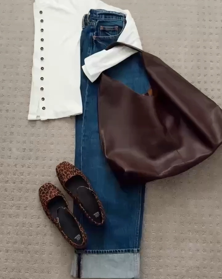 The viral 90s baggy jeans styled! 

Jeans are oversized—size down one. Cuffs are sewn. 

#LTKFindsUnder50 #LTKStyleTip #LTKShoeCrush