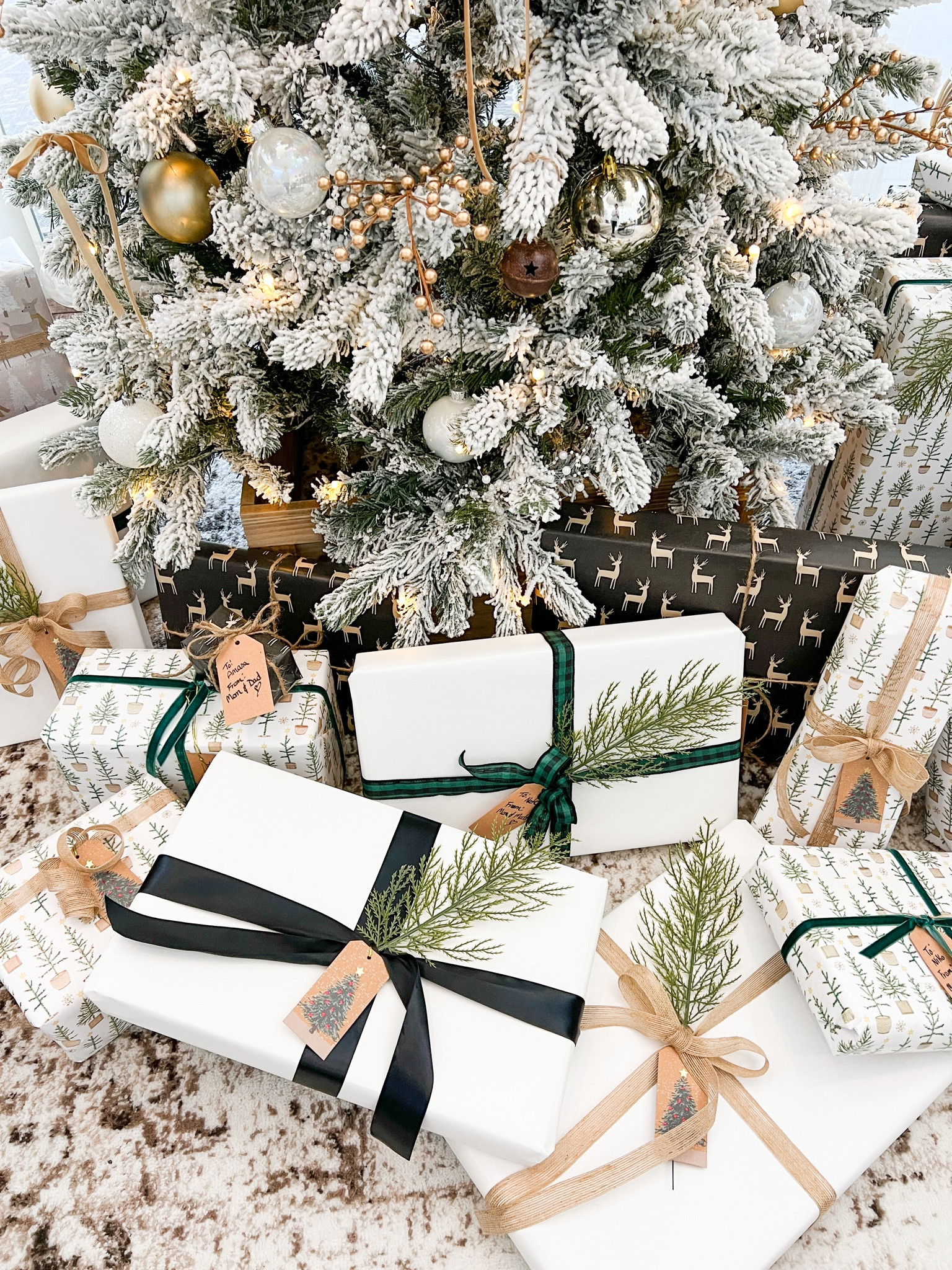 Simple neutral gift wrapping ideas, white wrapping paper, black ribbon with pine branches

#LTKHoliday #LTKCyberWeek #LTKSeasonal