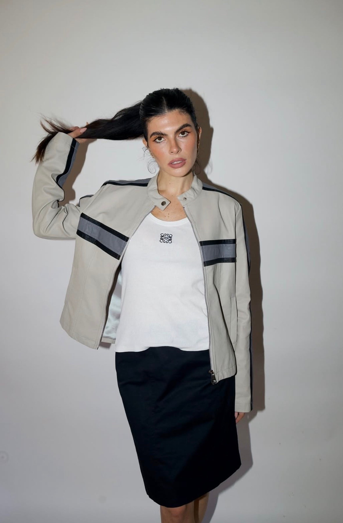 Nothing wrong with being an OUTLIER 🖤

Chic sporty style, elevated sporty style, styling a pencil skirt, Loewe white tank, leather sporty jacket

#LTKootd #LTKgrwm