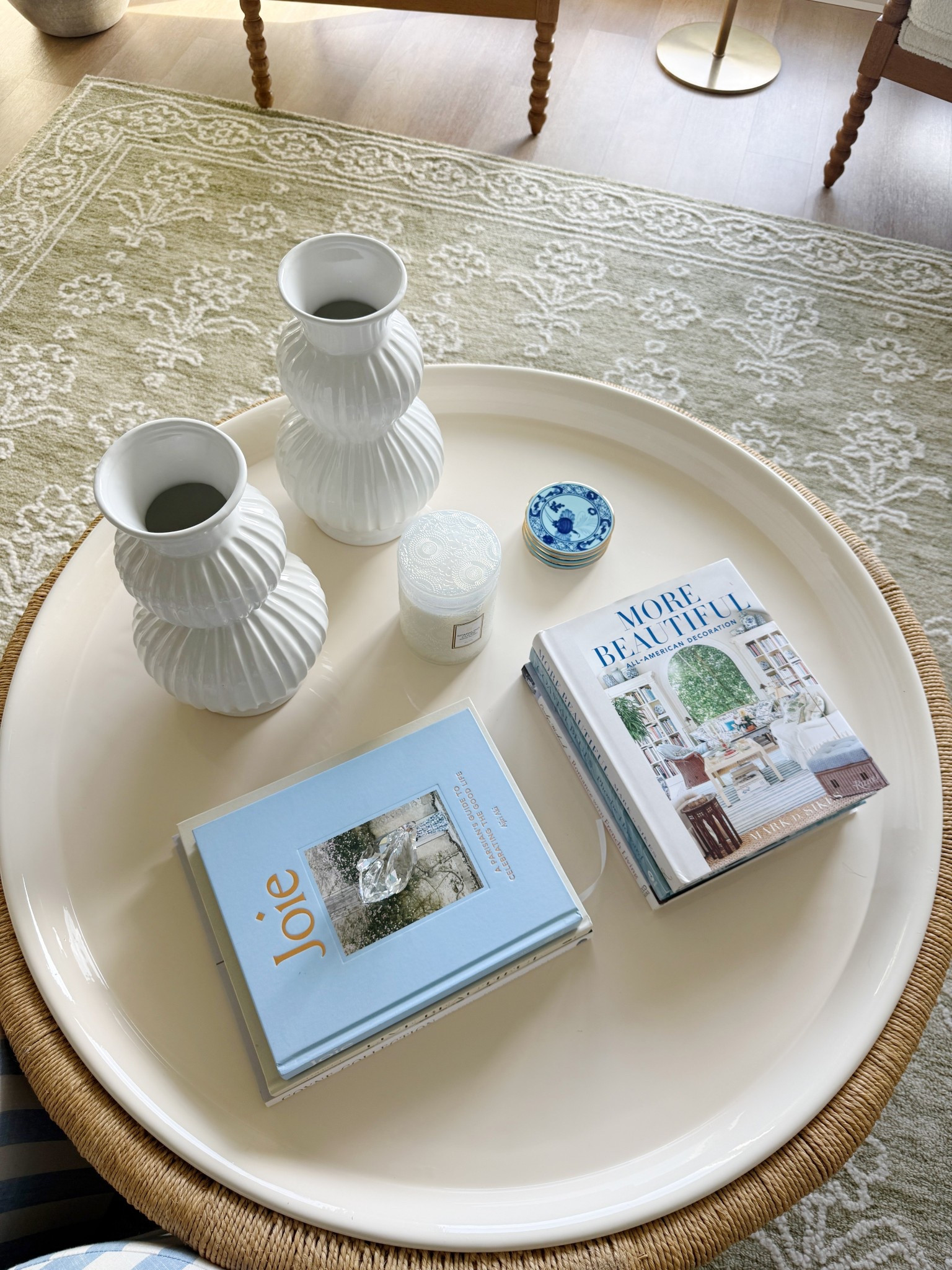 Coffee table refresh in my apartment! Just stacked some of my coffee table books I already had and added my new coasters! Linked below! 