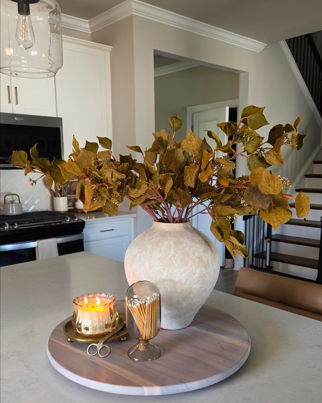 Bring warmth to your kitchen island with rich autumn foliage and cozy candlelight. Click the link to shop this fall centerpiece look.#FallDecor #KitchenDecor #FallVibes #HomeStyling

#LTKSeasonal #LTKHome