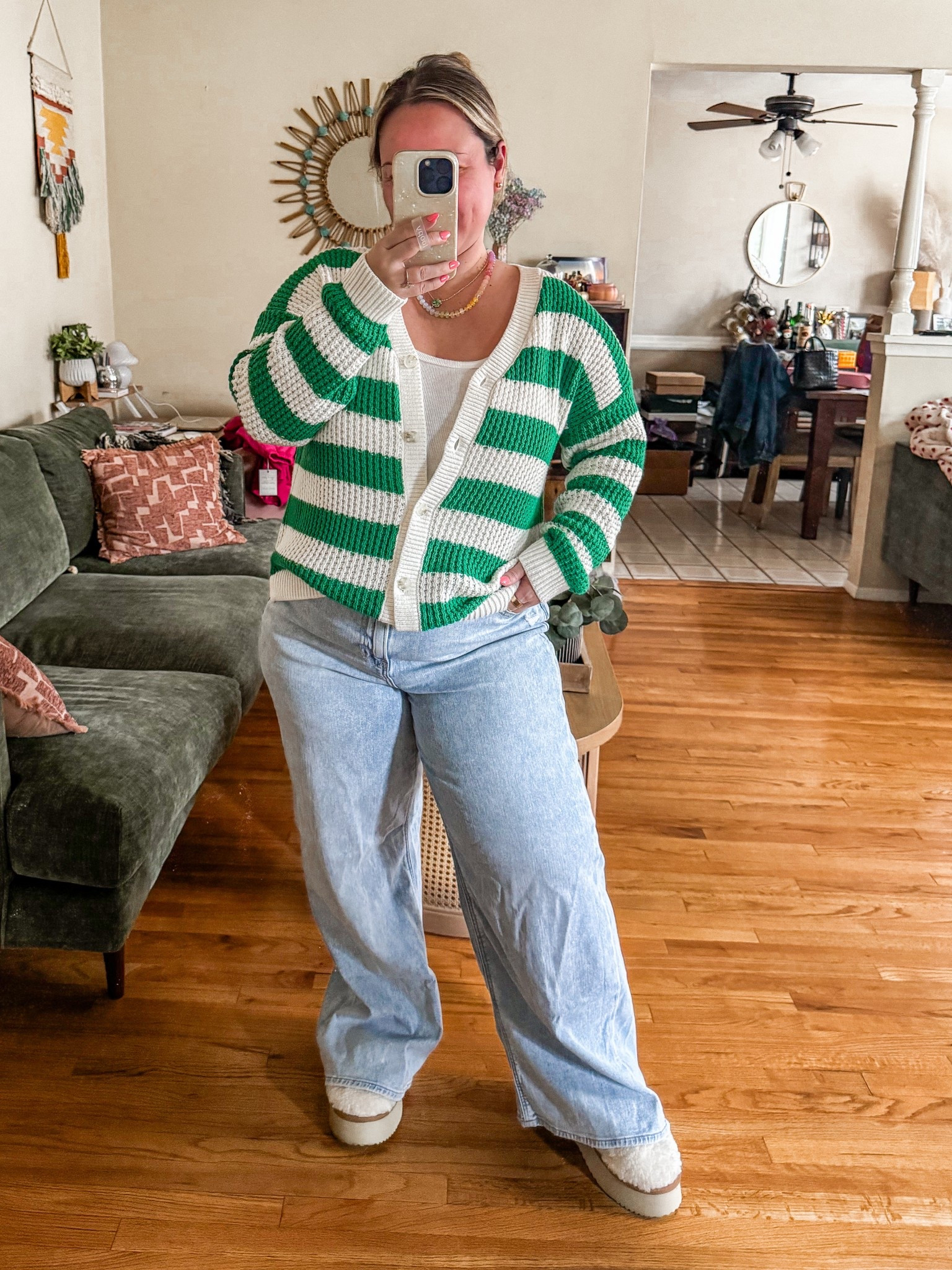 Midsize casual spring outfit 
Cardigan size MEDIUM also comes in blue! The green is great for spring and st Patrick’s day! 
Jeans size 14 short 
Shoes size up half size!  

Spring style, spring outfits, spring sweater, kohls finds, American Eagle, jeans, denim, wide leg jeans, casual style, spring break style

#LTKPetite #LTKOver40 #LTKMidsize