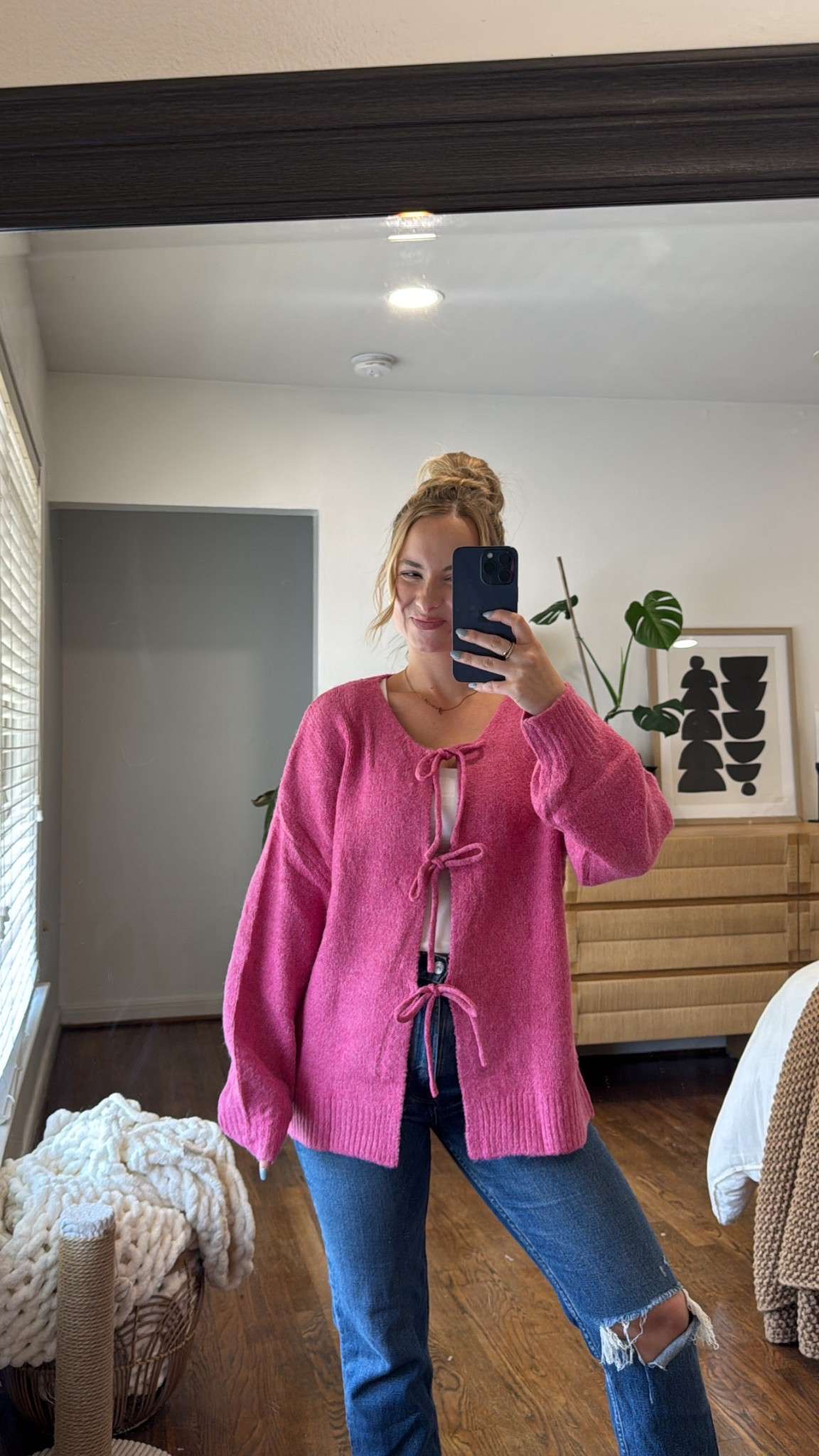 Cutest bow tie front cardigan for fall and winter! Wearing a size small - fits oversized.
 

 #LTKFindsUnder50 #LTKFindsUnder100