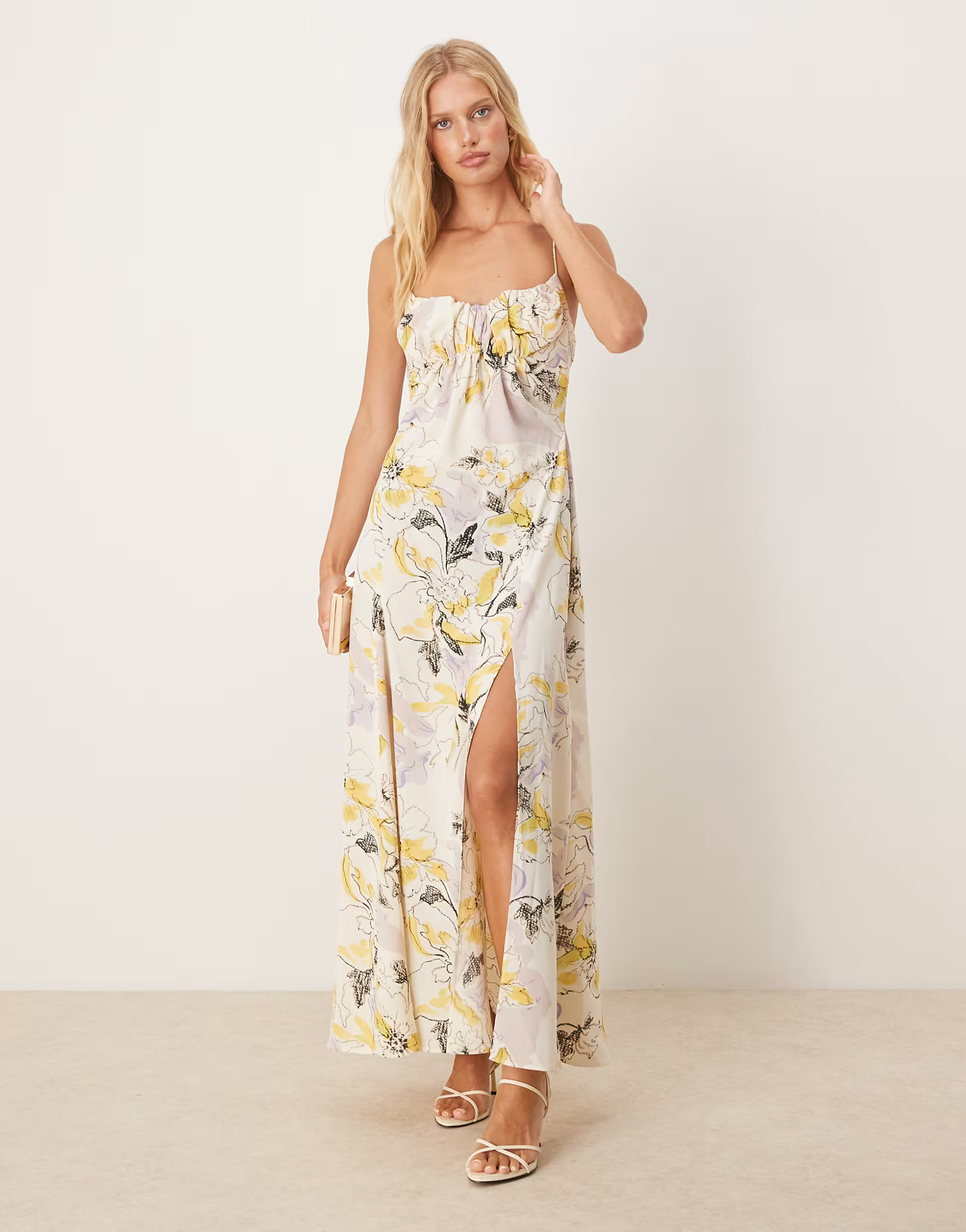 ASOS DESIGN gathered bust strappy cross back midi dress in yellow floral print | ASOS (Global)