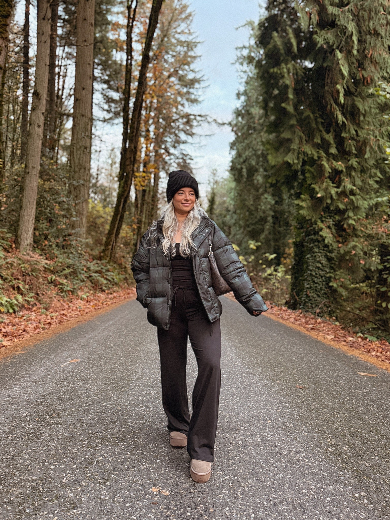 Fabletics outfit. Green Buffalo check puffer jacket, beanie, platform Uggs. Winter outfit inspo. Cold weather clothes.

Sizing deets:
Tank top: small
Coat: small
Pants: xs regular (would’ve done short option because I’m 5ft tall. They fit with platform shoes but are a little long otherwise.)