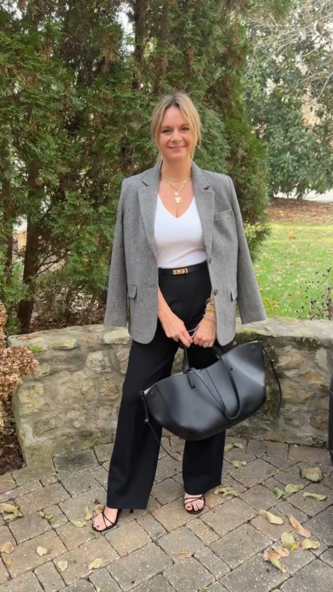 This is one of our favorite ways to style a blazer for work or client meetings because it’s all about the details. A tailored blazer layered over a simple cami and black trousers creates a clean, elevated foundation. But it’s the finishing touches that make the look feel truly polished. A great belt defines the waist and adds structure, while minimal jewelry and classic heels keep things refined. Finished with a sleek black tote bag, the outfit feels intentional, professional, and practical all at once. It’s an easy formula you can rely on when you want to look confident, put together, and still like yourself—without overthinking it.



#LTKgrwm #LTKootd #LTKdayinmylife
