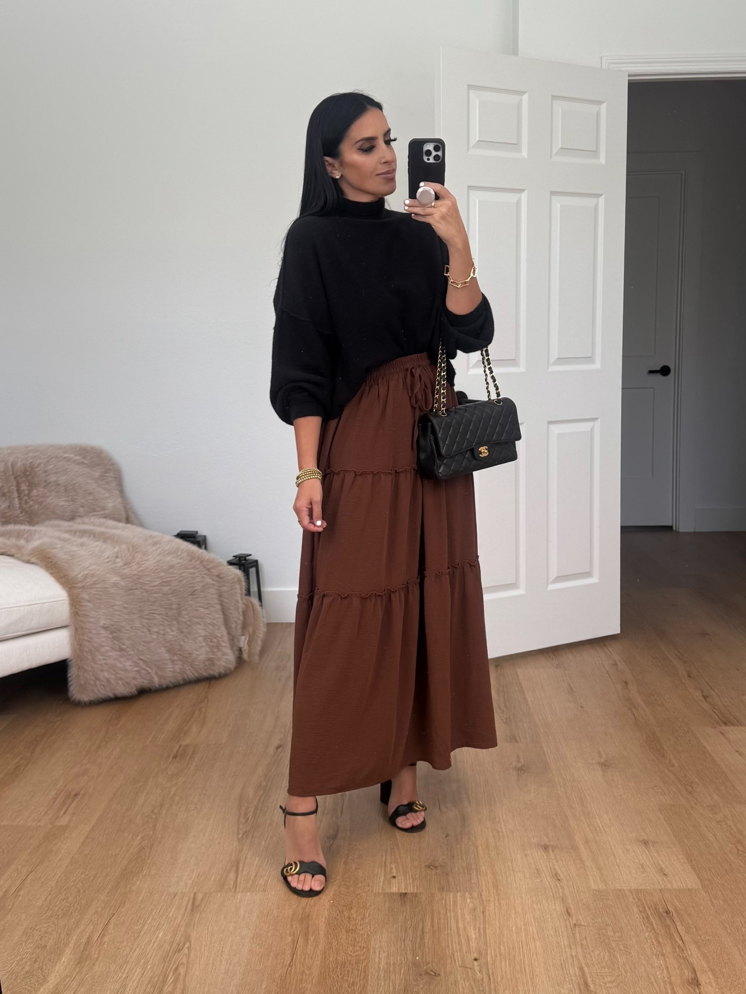 Brown maxi skirt under $30. Black turtleneck sweater. Gucci heels