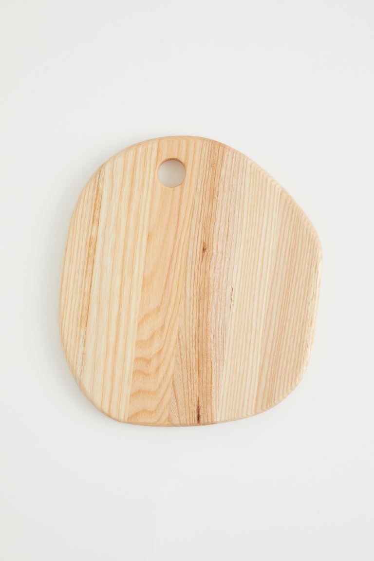 New ArrivalAsymmetric serving tray in ash wood with a hole at one end. Height 2 cm. Width at the ... | H&M (US + CA)