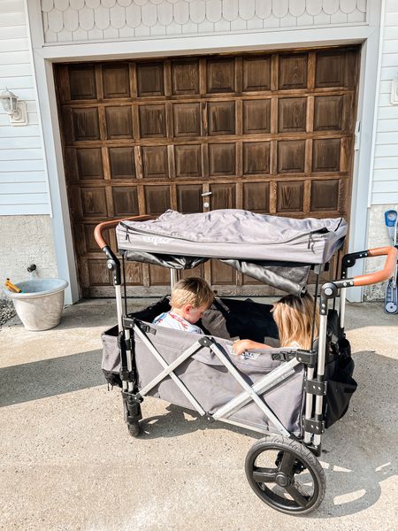 Our favorite kid wagon. 👏🏼 Comes with optional cover for shade and a detachable cooler. So many storage pockets. And straps for the littlest in your crew. 

#LTKfamily #LTKkids #LTKtravel