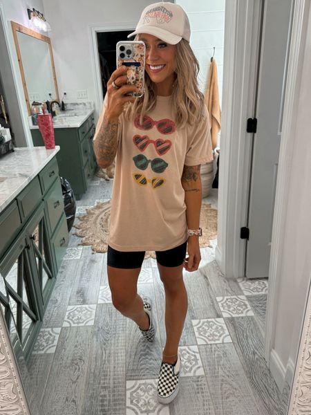 We have a lil graphic tee haul this morning AND A DISCOUNT CODE🤌🏼✨🫶🏼 love my Mountain Moverz tees! I size up to a L for an oversized fit most of the time! Code HOLLEY25 saves you 25% off or code HOLLEY3 for 3 tees for $75! 🤎

Graphic tees / spring style / outfit inspo / biker short inspo / Holley Gabrielle 

#LTKsalealert #LTKstyletip #LTKfindsunder50