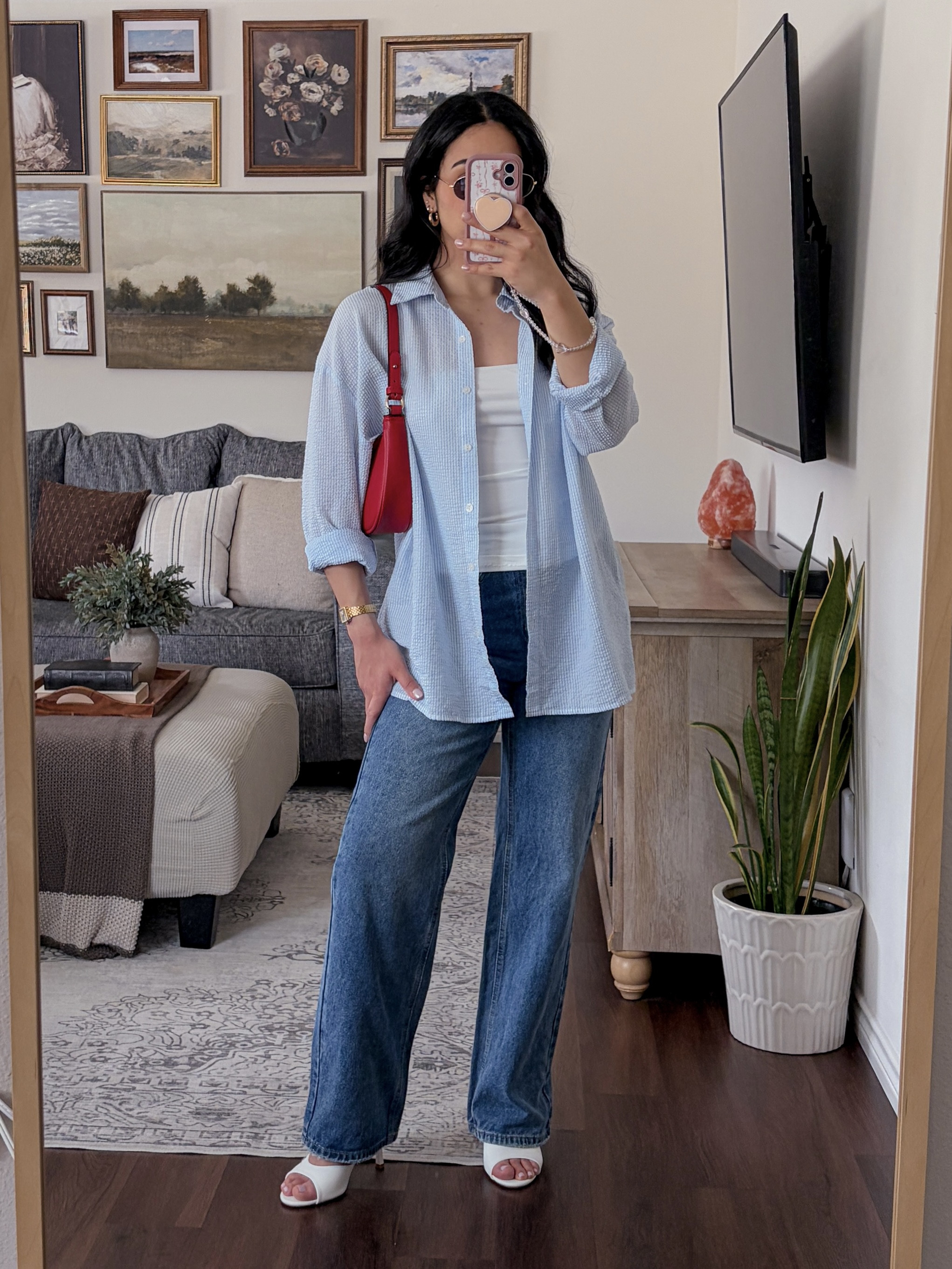 elevated casual outfit of the day 🌹 spring outfit inspo, elevated casual spring outfit, striped button down outfit, wide leg jeans outfit, chic casual spring look, effortless spring style, everyday chic outfit idea, spring street style, white bandeau top outfit, blue striped button down layered look, oversized button down outfit, wide leg denim jeans outfit, white open toe kitten heels, casual chic denim outfit formula, red shoulder bag outfit, statement bag styling, trendy oval sunglasses, gold frame sunglasses outfit, layered gold jewelry styling, minimalist chic accessories, parisian inspired outfit, coastal chic aesthetic, cool girl casual style, effortless model off duty look, pinterest inspired outfit, clean girl spring fashion, spring outfit pinterest inspo, striped shirt outfit ideas, wide leg jeans styling, elevated casual outfit board, fashion girl aesthetic, amazon fashion finds, amazon style finds, amazon fashion favorites  

 #LTKSpringSale #LTKgrwm #LTKootd