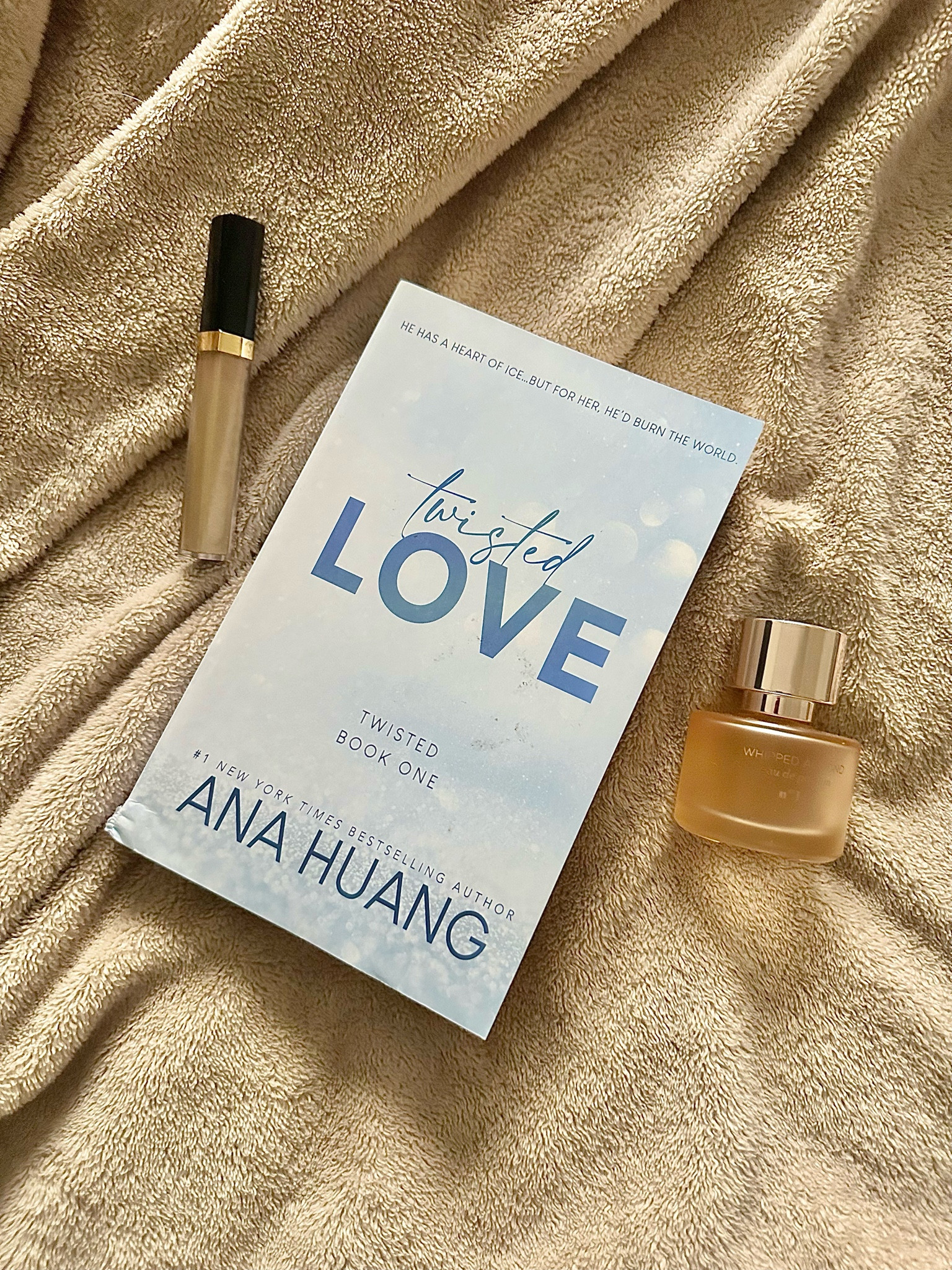 First book read of 2025. With cozy fragrance and lip gloss. #cozyfragrance # luxelipgloss # romancebookrecs 

#LTKU #LTKGiftGuide #LTKBeauty
