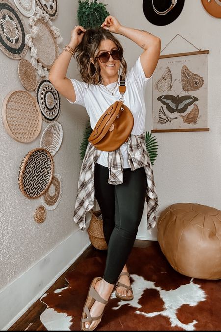Casual leggings and white tee shirt outfit. Wearing small in leggings and medium in tee. Medium in flannel for oversized fit. Belt bag and lightning bolt earrings 

#LTKU #LTKStyleTip