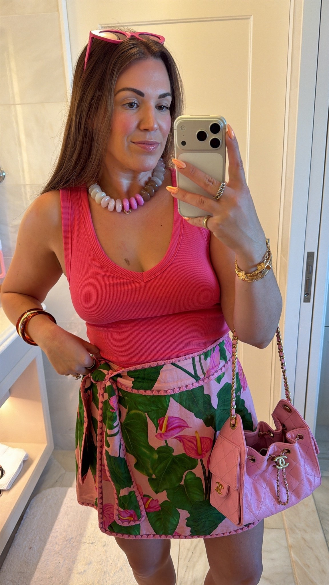 curvy midsize pink and palm vacation outfit! wearing size medium in bra tank and size large in printed skort! on sale!

#LTKSeasonal #LTKMidsize #LTKTravel