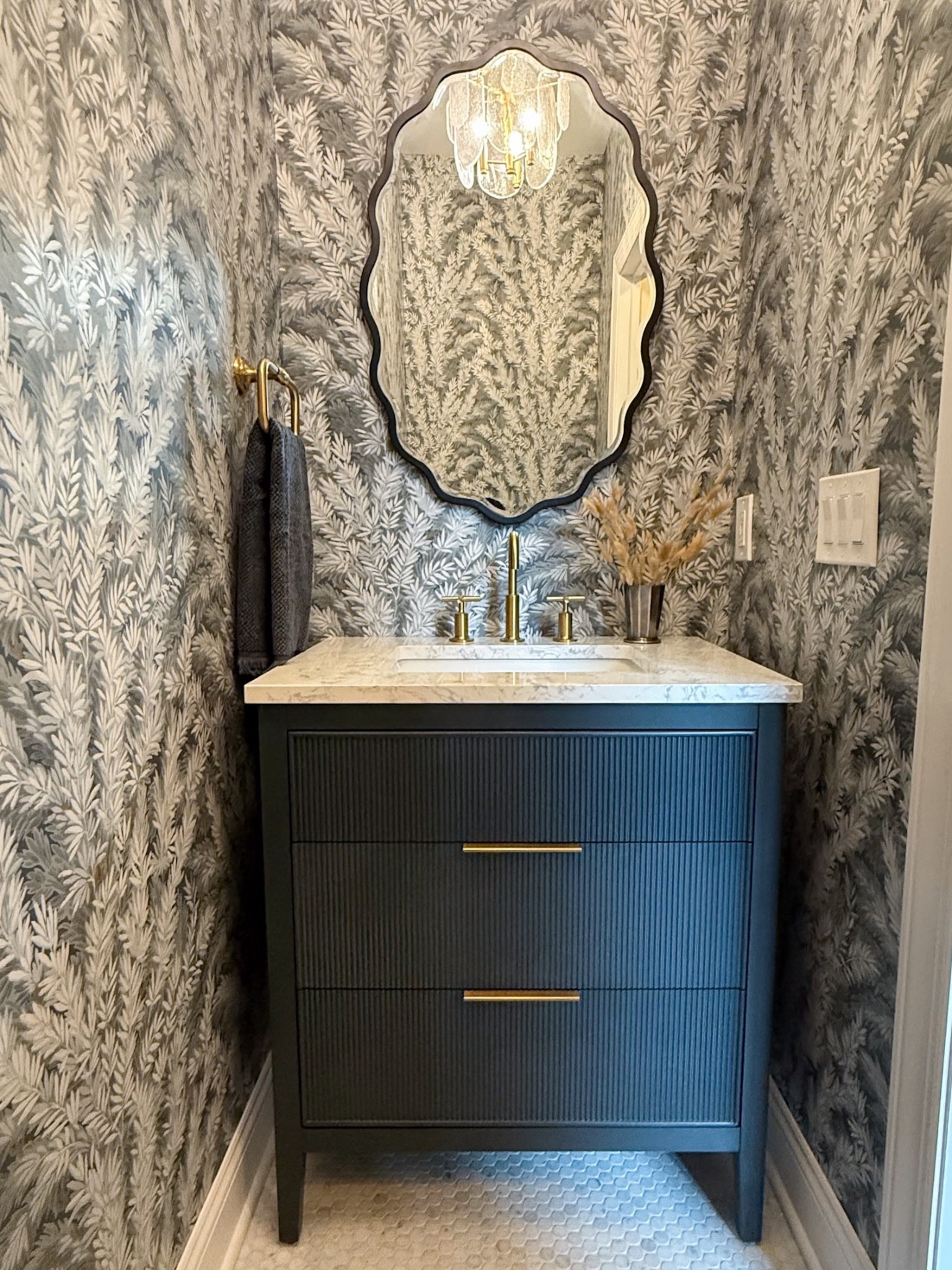 This moody powder room just might be one of my favorites to date!! Blues and grays with brass accents and marble — such a classic. Linked what I could! 

#LTKStyleTip #LTKHome #LTKSeasonal