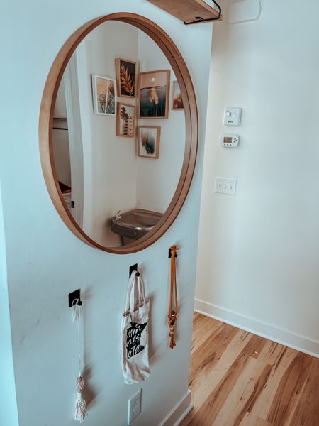The answer is yes.
Get a drinking fountain in your house.
But I also love this little book because of the huge circle mirror and wall hangings. And frames are artwork from Minted! 

#LTKFind #LTKhome #LTKSeasonal