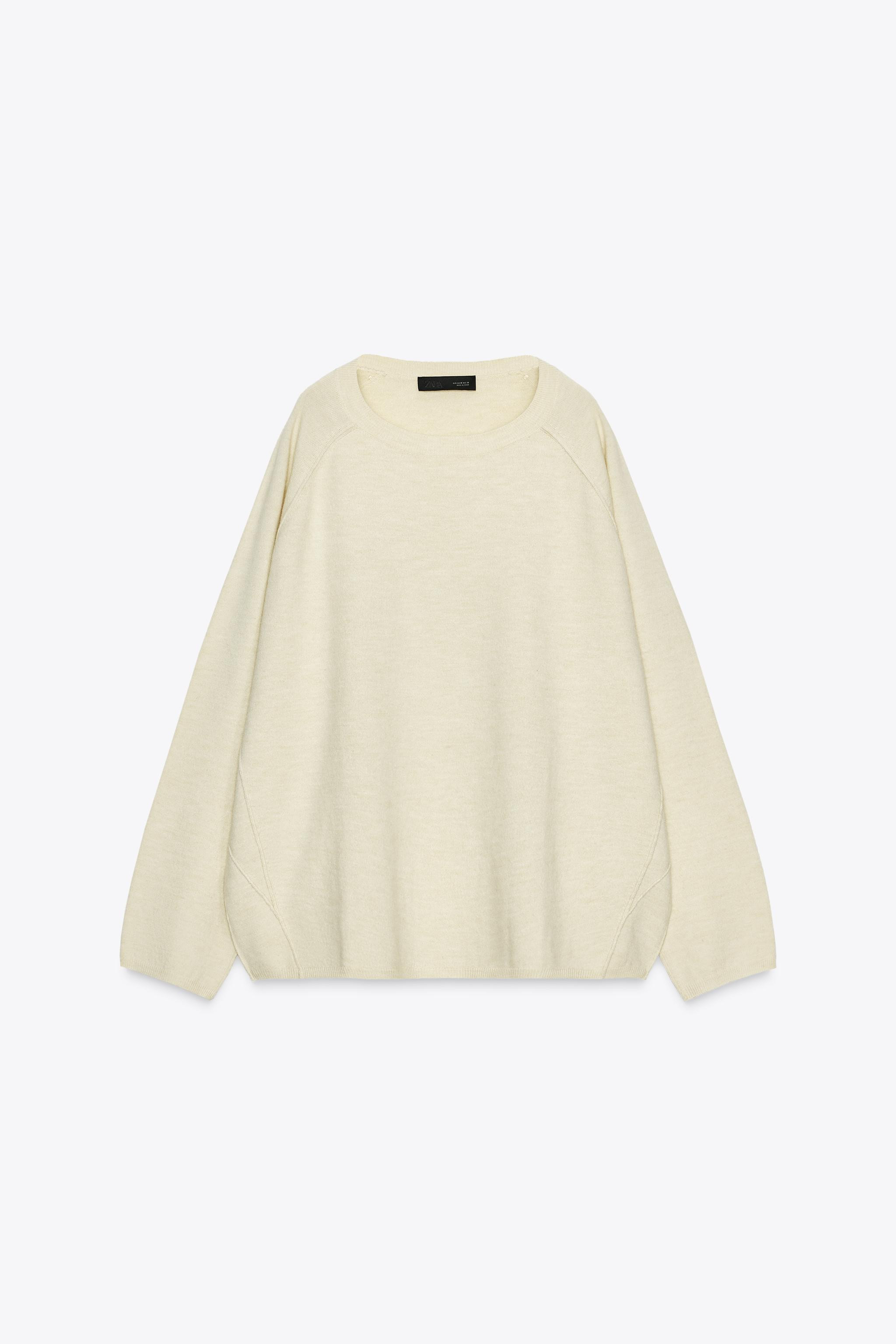 Loose-fitting, round neck, long sleeve sweater. Finished with detailed, marked seams. | Zara US