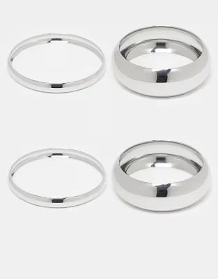 ASOS DESIGN pack of 4 bangle bracelets in mixed design in silver | ASOS | ASOS (Global)