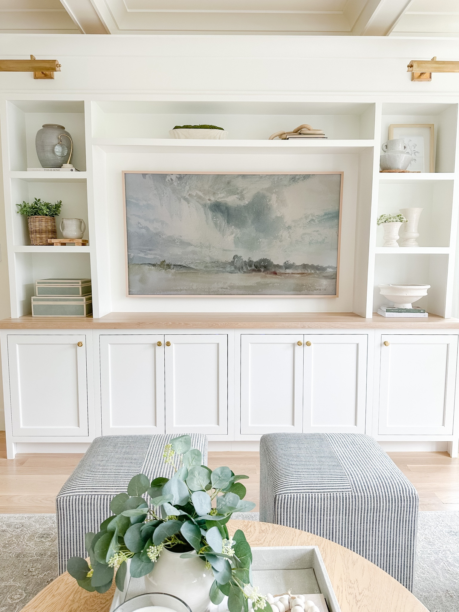 Entertainment center shelf styling, Frame tv art, Amazon decor, Amazon home, cube ottoman, neutral home, home decor, cube ottoman 

#LTKsalealert #LTKhome #LTKstyletip