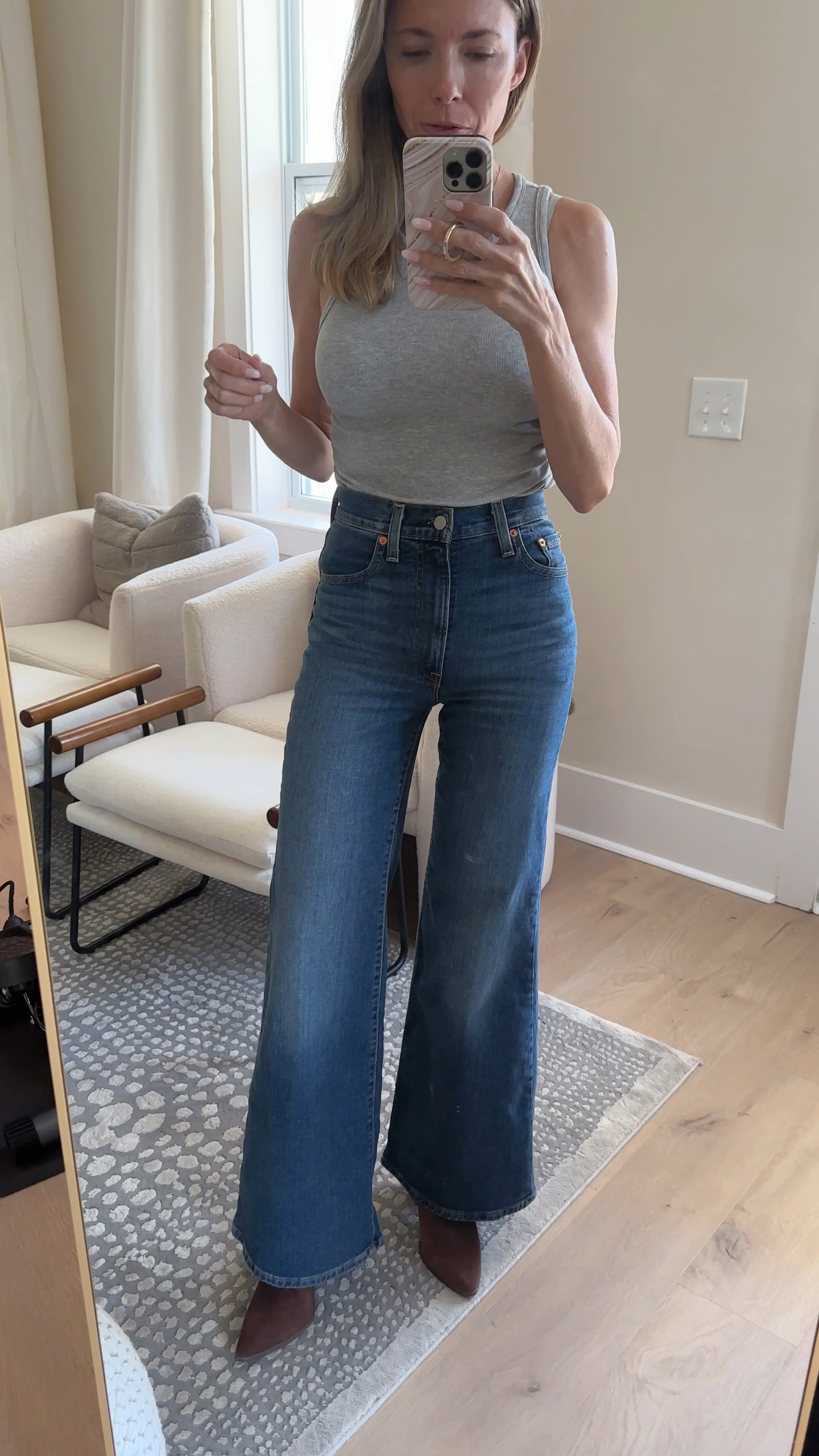 Rib cage high, flare leg jeans for $70.  

#LTKStyleTip #LTKFindsUnder100 #LTKOver40