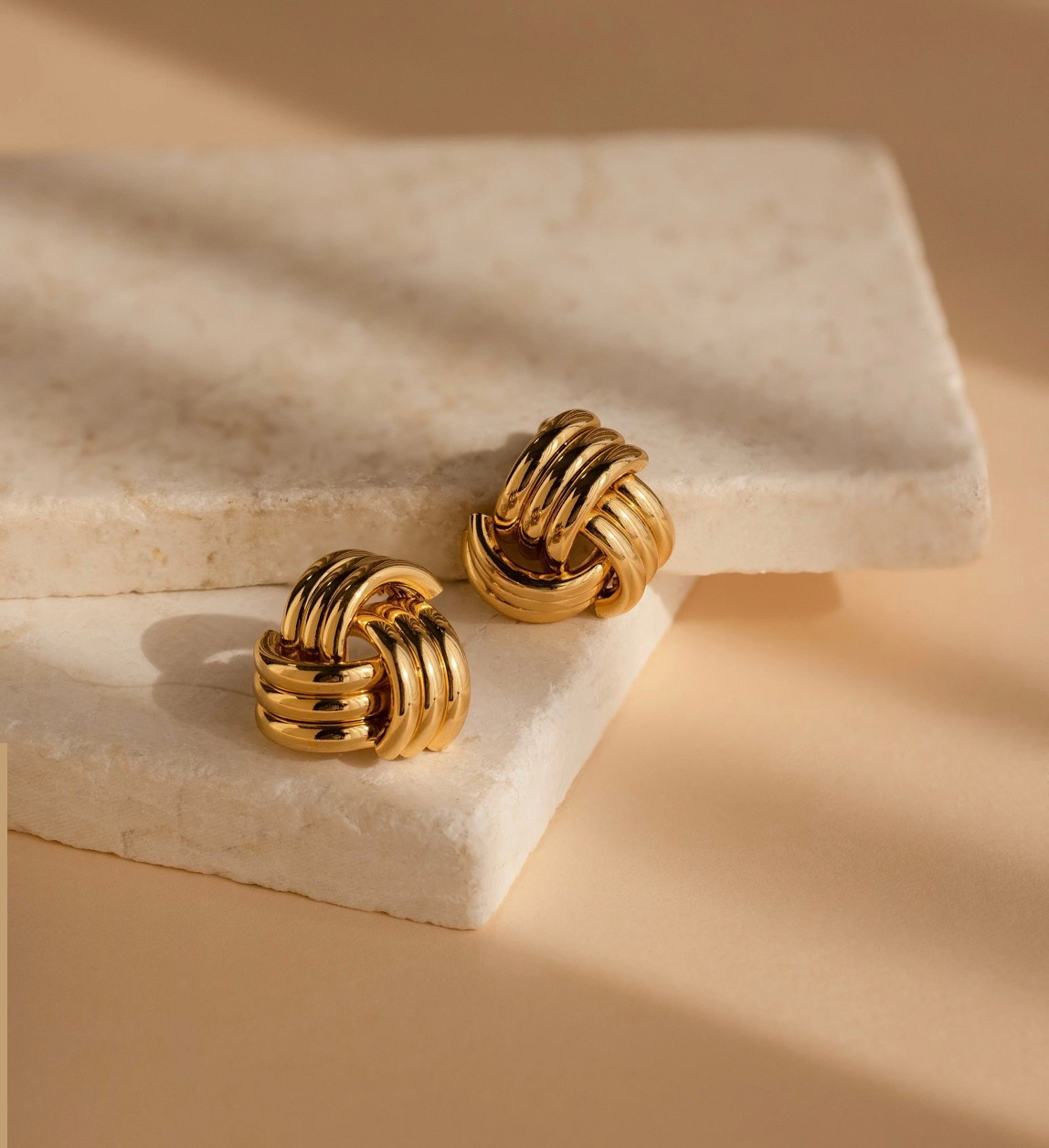 Affordable luxury - triple knot earrings 

#LTKSaleAlert #LTKFindsUnder50