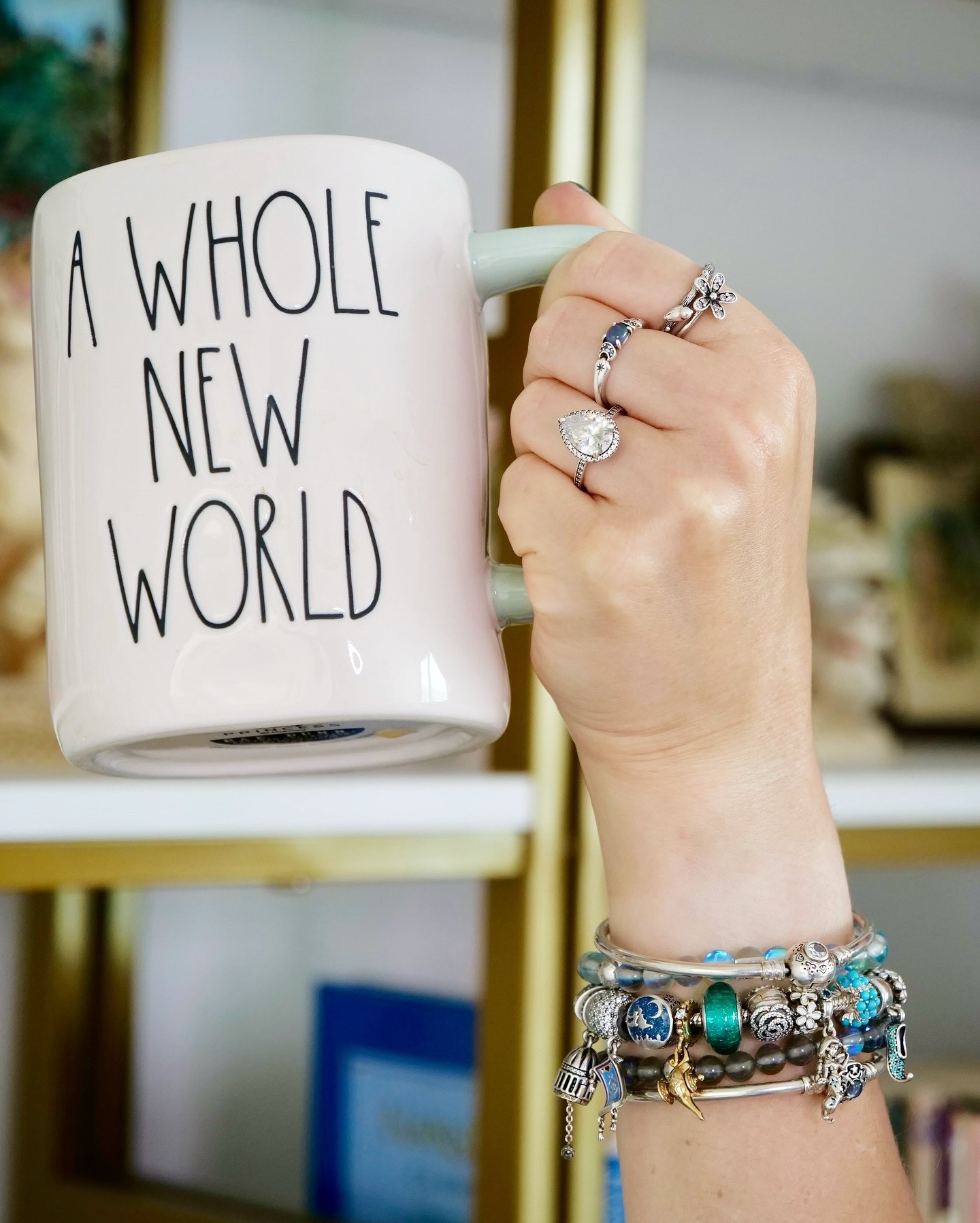 ✨ I couldn’t wait any longer to update my two Jasmine inspired charm bracelets onto one Pandora bracelet! ✨ The colours and feeling of the design remind me of my childhood! Disney’s Aladdin was my favourite Disney film and I remember spending hot summer days playing outside, pretending to be the different characters with my family…or staying cool in the basement watching all of the films! ✨

I am almost done editing a new @theartofpandora blog post sharing a detailed look at this bracelet design, as well as an accompanying YouTube video about the design process. There’s a special Pandora Charm on this breather from the new Summer Pandora Collection. Can you spot it? ✨ Don’t forget to enter the Summer Bracelet Design Contest!!!! ✨✨

Tea @davidstea Green Passionfruit 🍵✨ in my Disney Princesses @raedunn mug! 🍵

Do you have a Disney Aladdin themed Pandora Charm Bracelet? ✨
@disneyaladdin Princess Jasmine inspired bracelet, charm bracelet, Pandora jewellery, Disney jewelry, Disney style, Disney fashion, Disney Aladdin, a whole new world, DAVIDsTEA #disneyxpandora #disneyjewelry #disneypandora #pandorabracelet #pandorajewellery #pandorastyle #pandoracharms #disneyaladdin #awholenewworld #princessjasmine #princessjewellery #pandoradisney

#LTKcanada #LTKstyletip