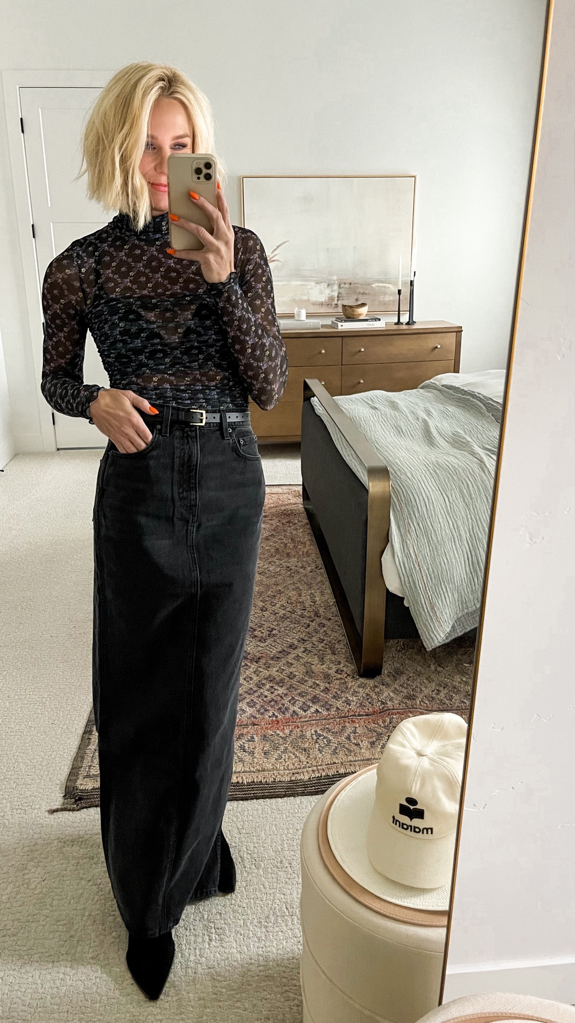 I’ve been holding out on this hot trend (denim maxi skirt!) just patiently waiting to find the perfect one. I think I found it! Gorgeous mesh top, and classic black belt and boots to wear with all of your Fall outfits. 🖤
Skirt: runs TTS (smidge big in waist) wearing 27 
Mesh top: runs TTS
Boots: runs TTS
Belt: runs big, wearing XS/S

#LTKSeasonal #LTKHoliday #LTKfindsunder50