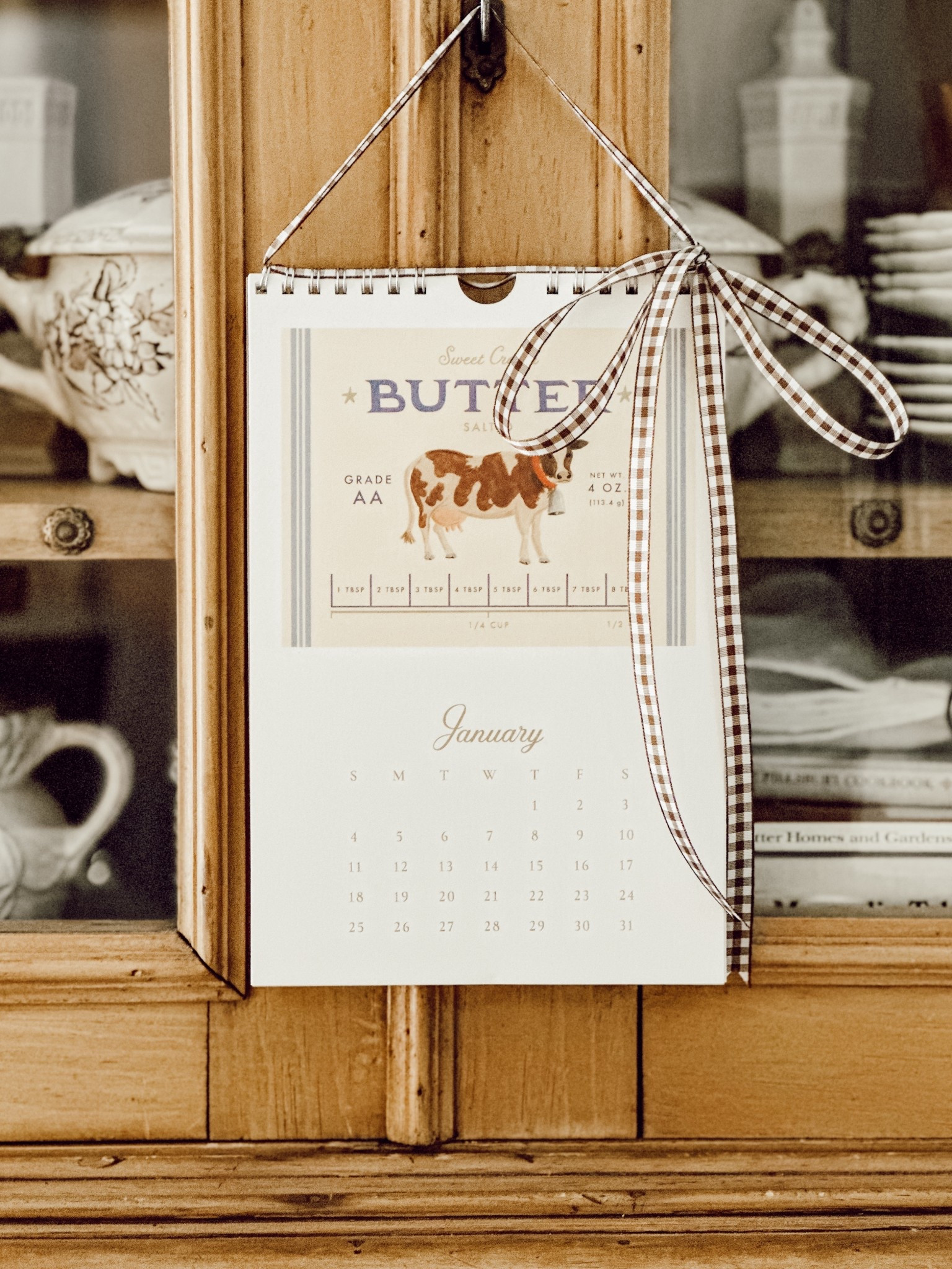 Remember that your calendars can be decoration too. I hung ours using ribbon on our kitchen hutch. 

#LTKFindsUnder50 #LTKHome