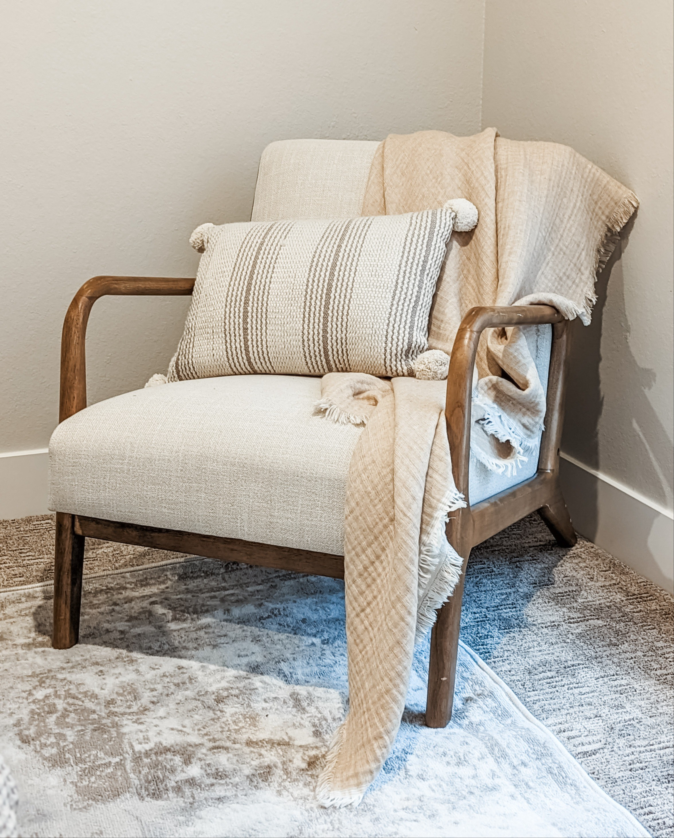 Increase usage of the corners of your room with a seating area! This chair is one of our favorites and was recently used in a vacation rental we styled. Add layers of cozy with throw blankets and pillows. 

#LTKhome