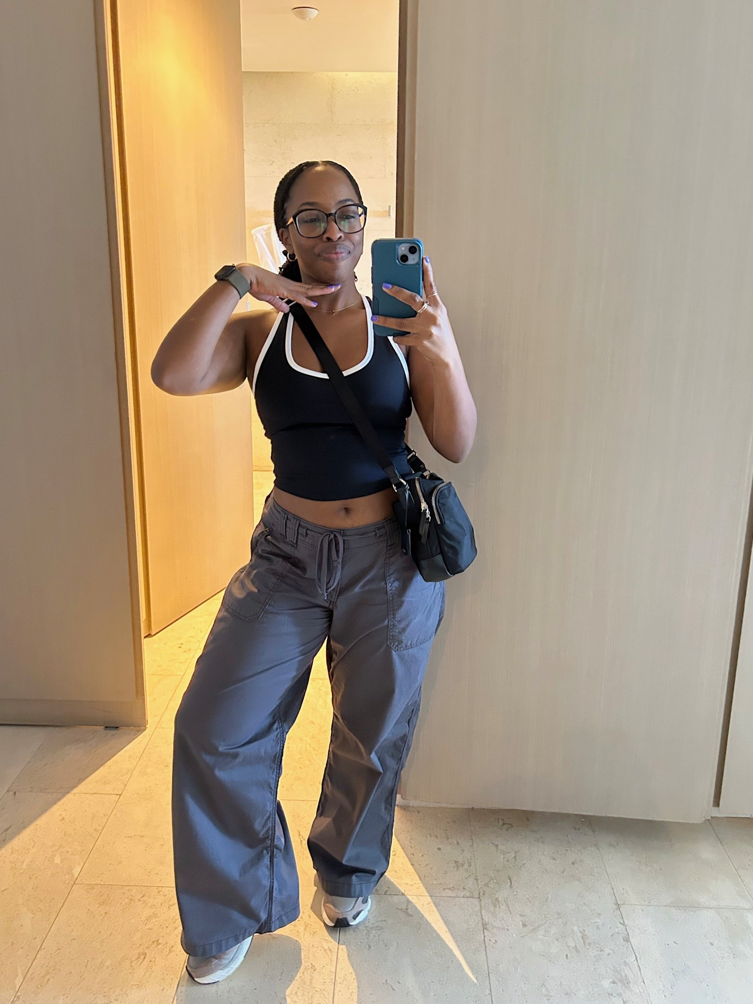 My new fave airport outfit combo. The baggy pants are super comfy and the cropped activewear halter will keep you cool throughout the day. 

#LTKPetite #LTKFindsUnder50 #LTKSaleAlert