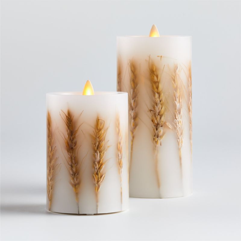 Flickering Flameless Wheat Inclusion Wax Pillar Candles | Crate and Barrel | Crate & Barrel