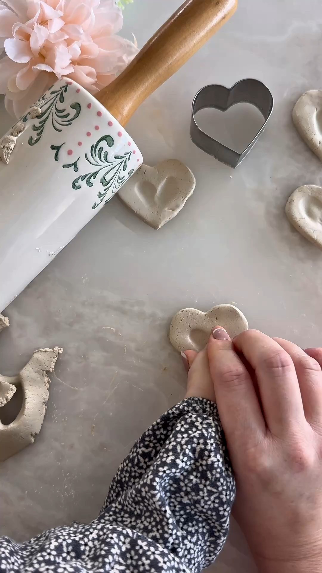 Little Roger and I had so much fun creating these Valentine’s fingerprint heart magnets out of air-dry clay!
We made 3 heart magnets with Rog’s fingers and 3 with Sabrina’s, but one of little Rog’s was gifted to my father for his birthday!
We painted them with acrylic paint, sealed them with Mod Podge, and then I used E6000 glue to attach a magnet to the back.
This was a project we did over several days, so that it had time to dry at each step. 
But that just spread the love out a bit and made the fun last longer! @Michaels 

#LTKValentine #LTKmomlife #LTKKids