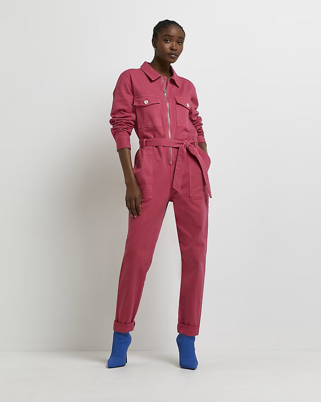 Pink belted denim jumpsuit | River Island (UK & IE)