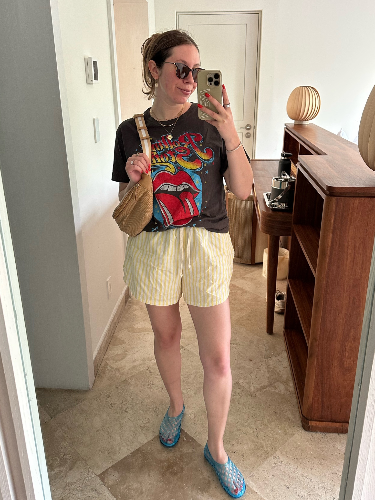 SUMMER IS (almost) HERE !! I am a year late to the party but loving jelly shoes - these were only $50. Also really loving stripes and more like preppy things paired with laid back pieces like a band tee. This top from Daydreamer LA is on sale but the shorts are old so linked similar. Happy almost summer 🌞

#LTKtravel #LTKstyletip #LTKSeasonal