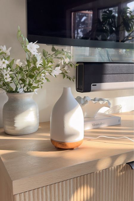 Aesthetic ceramic oil diffuser that makes the perfect gift for anyone! Home decor, living room decor, living room refresh, neutral home, aromatherapy, essential oils

#LTKFindsUnder50 #LTKHome #LTKGiftGuide