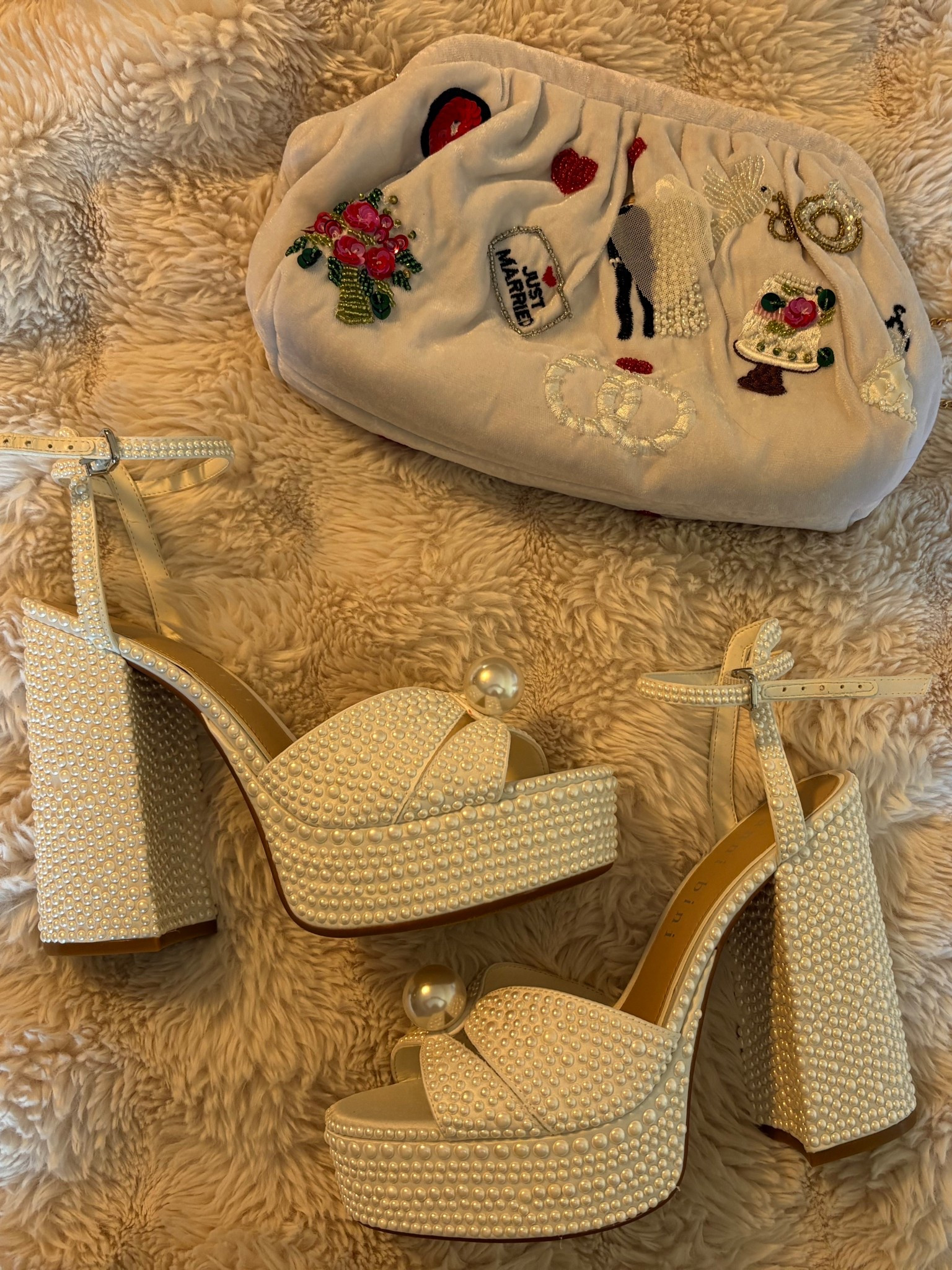 The cutest heels for a wedding! I wore them for about 5 hours and they were pretty comfy! My bag is from TJ Maxx and I can't find the same one but linking several options.

Wedding. Wedding Shoes. Wedding Heels. Pearl Heels. Bridal Looks

#LTKgrwm #LTKWedding #LTKstorytime