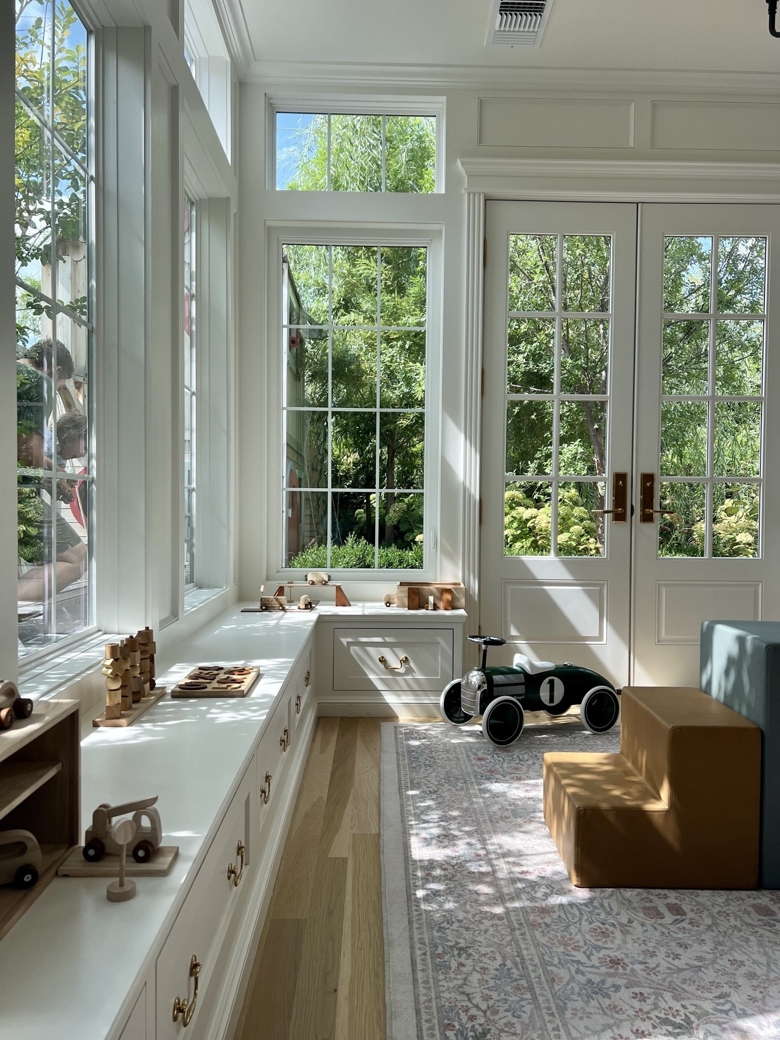 Our sunroom playroom ☀️ the most used & cherished room in the home. Linked some elements of the room here. Our line of wooden toys & classic ride on car can be found in our shop Heirloomterrain.com 🧸

#LTKhome #LTKkids #LTKstyletip #LTKfamily