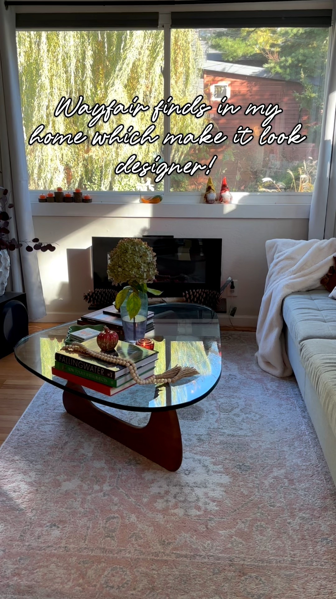 Wayfair finds in my home which make it look designer! I love everything I have bought from Wayfair, Noguchi style coffee table, affordable rugs, grey loveseat, metal cabinet, green accent chair (they have other colors). #homedecor #livingroom #styling

#LTKHoliday #LTKSeasonal #LTKHome