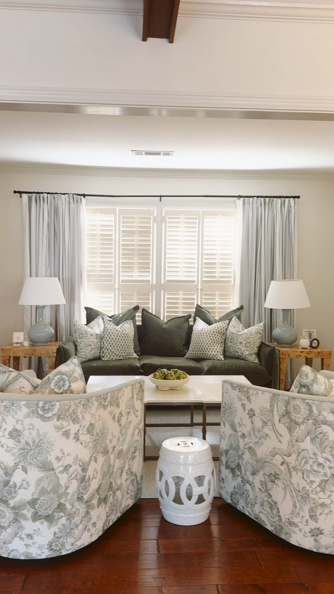 Conversation room is cueing all the modern southern decor and I’m here for it. Traditional floral patterns, hues of blue and green, creamy whites, curves, and a touch of Burl wood. Mixed high and low to achieve this design & couldn’t love it more. Mostly Amazon, & Ballard. custom Mae Davis chairs (not linked) 

#LTKHome #LTKVideo #LTKStyleTip