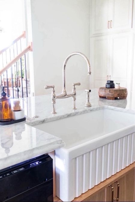 Do you prefer the traditional-styled flat front or fluted band? I love our stunning Fluted Front Apron Farmhouse sink with the fluted band to add some texture 🙌🏻

Kitchen sink, kitchen remodel, kitchen makeover, faucet remodel, kitchen must have, home decor ideas, simple home decor, DIY inspo #LTKFind 

#LTKhome