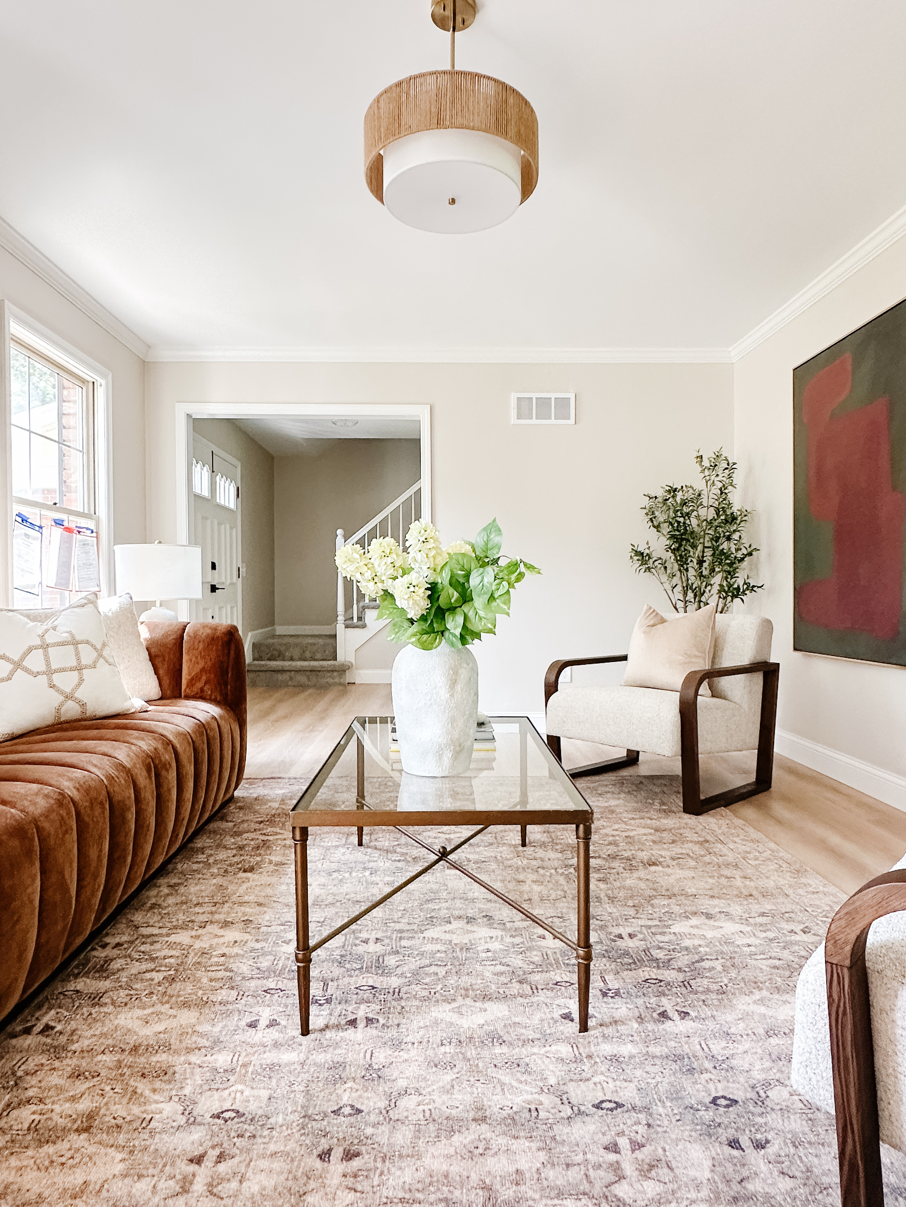 🤎 Warmly Sophisticated Vibes Only
This room is giving rich textures, clean lines, and just the right amount of contrast. I’m in love with how the caramel velvet sofa warms up the space while the light boucle chairs and soft rug keep things feeling fresh and airy.

The round mirror + black console combo is one of my go-to styling tricks — simple, balanced, and always timeless. Everything is linked for you, from furniture to decor! Tap to shop the full look or save for your next living room mood board 🖤

#LTKhome #InteriorGoals #NeutralLivingRoom #ModernClassic #VelvetSofa #LikeToKnowIt #StylingTips #CozyChic

 

 

#LTKHome #LTKStyleTip