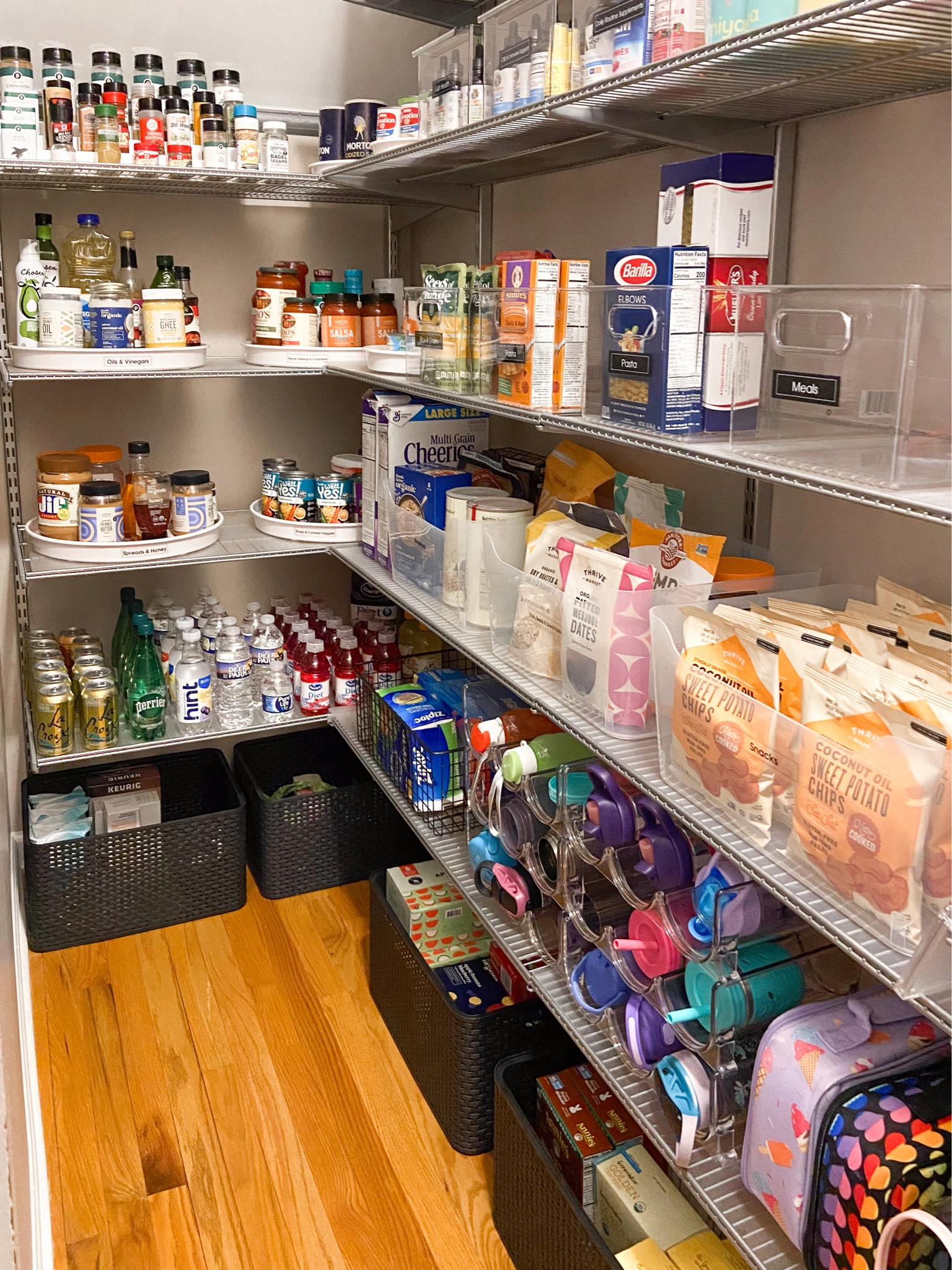 With ample shelf space, lots of vertical space already being utilized, and a client that was ready to purge, we saw the potential this space held as soon as we walked in! 

Our plan for success:

✨Bring the kid stuff down to kid level. At ages 3 and 5, they’re becoming more independent so having access to their snacks, bowls, and cups makes life SO much easier on their parents.

✨Clear and translucent bins to bring some brightness in (and so you can see everything you have!) When you’re low on natural light, this style of bin gives a lighter feel. 

✨Turntables are the best way to utilize corners and deep shelves full of small items like sauces. No more letting things expire in the back of the pantry 🙅🏻‍♀️

✨Labels keep you accountable! If you’re guilty of just tossing things anywhere and saying, “I’ll put it away later,” a label will make you think twice. It’s a visual reminder that the item doesn’t belong there. 

Whose pantry is next?! 🤩 

#LTKhome #LTKFind #LTKunder50