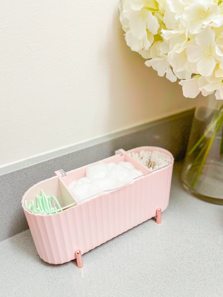 Amazon bathroom finds under $15! Recently upgraded my bathroom countertops with this adorable and functional storage container! For the longest time I was just using the cotton balls and such straight out of the bag but really wanted to find something that would not only separate my everyday items but keep it clean. I like that is has an acrylic lid to open and close to keep the items sanitary, as the bathroom tends to gather more dust with the humidity. This storage container has 3 separation slots that can be taken out for your own best use! I personally have cotton balls, a-tips, and floss picks as some of my everyday routine items. Comes in pink and white too! 


#LTKbeauty #LTKhome #LTKfindsunder50