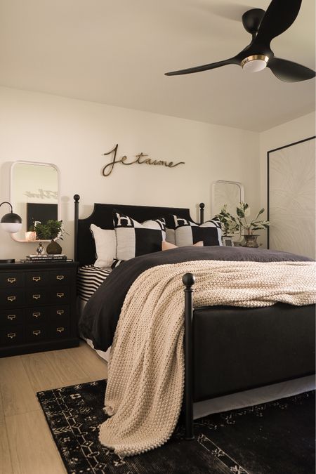 Guest bedroom decor 
Amazon home decor 
Black bed 
Black Upholstered bed 
Black nightstand 
White mirror 
Black lamp 
Modern decor 
Black rug 
H pillows 
#meandmrjones 

#LTKhome #LTKunder50 #LTKunder100