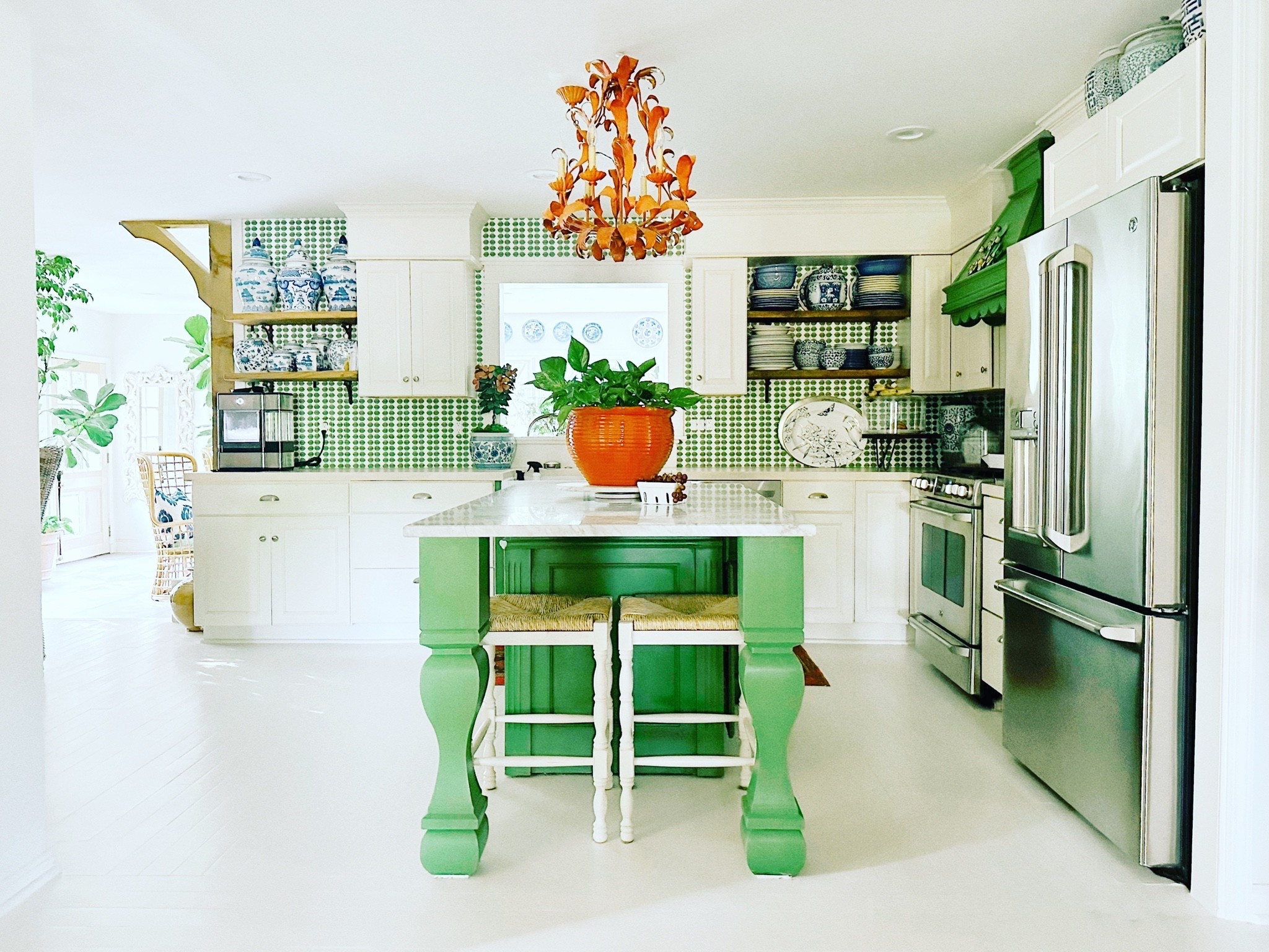 One of my favorite rooms in our home.  Who doesn’t love the kitchen?  Green wallpaper and blue & white dishes and a pop of orange it’s proof that a kitchen can be hardworking and full of personality.
Shop the look below.

#LTKdayinmylife #LTKHome