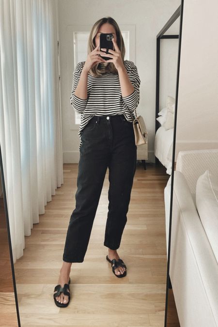 Striped shirt and black jeans 