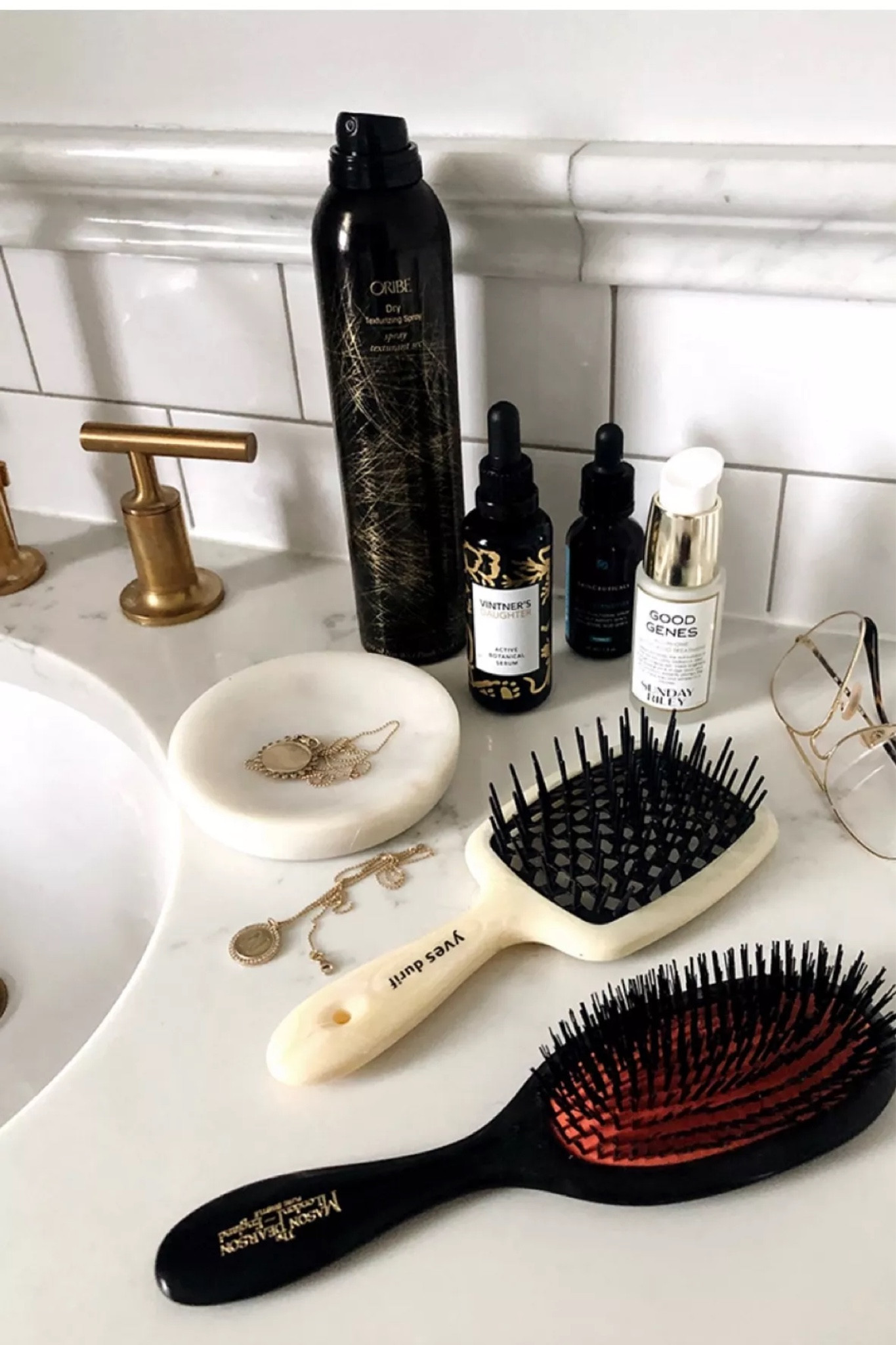 The two brushes I cannot live without: the #YvesDurif vented hair brush I use for gently combing out my wet hair. i also love to use for the initial blow drying stage before moving on to a round brush. The #MasonPearson I use for smoothing my hair. It stimulates the scalp and distributes oil from roots to ends. Also my favorite brush for smoothing out my hair when I wear in a low bun style. 

#LTKBeauty