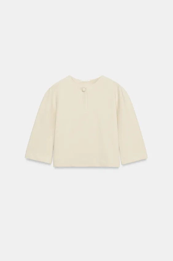 Model height: 178 cmSweatshirt made from a cotton blend. Featuring a round neck, below-the-elbow ... | Zara UK