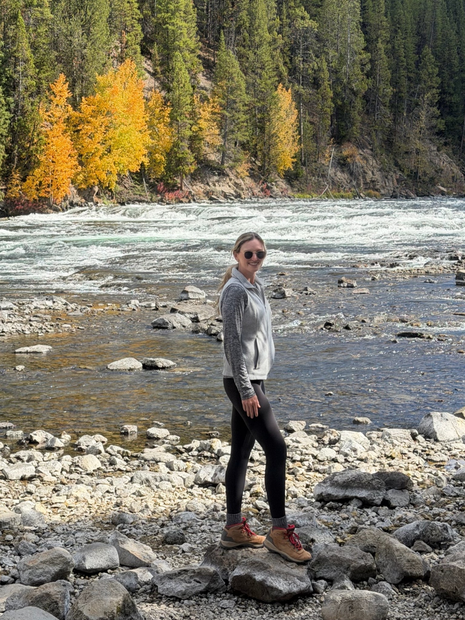 Yellowstone fall hiking outfit. Black leggings, grey heathered long sleeve top, grey soft vest, comfortable beginner hiking boots

#LTKTravel #LTKTall #LTKActive